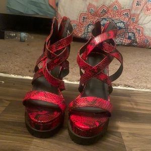 Wore only a couple times. Size is 7 1/2. Red and black leopard print